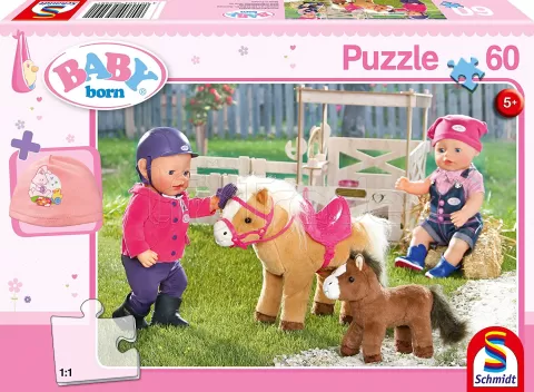 Photo de Puzzle Schmidt - Baby Born fait du poney (60 pièces)